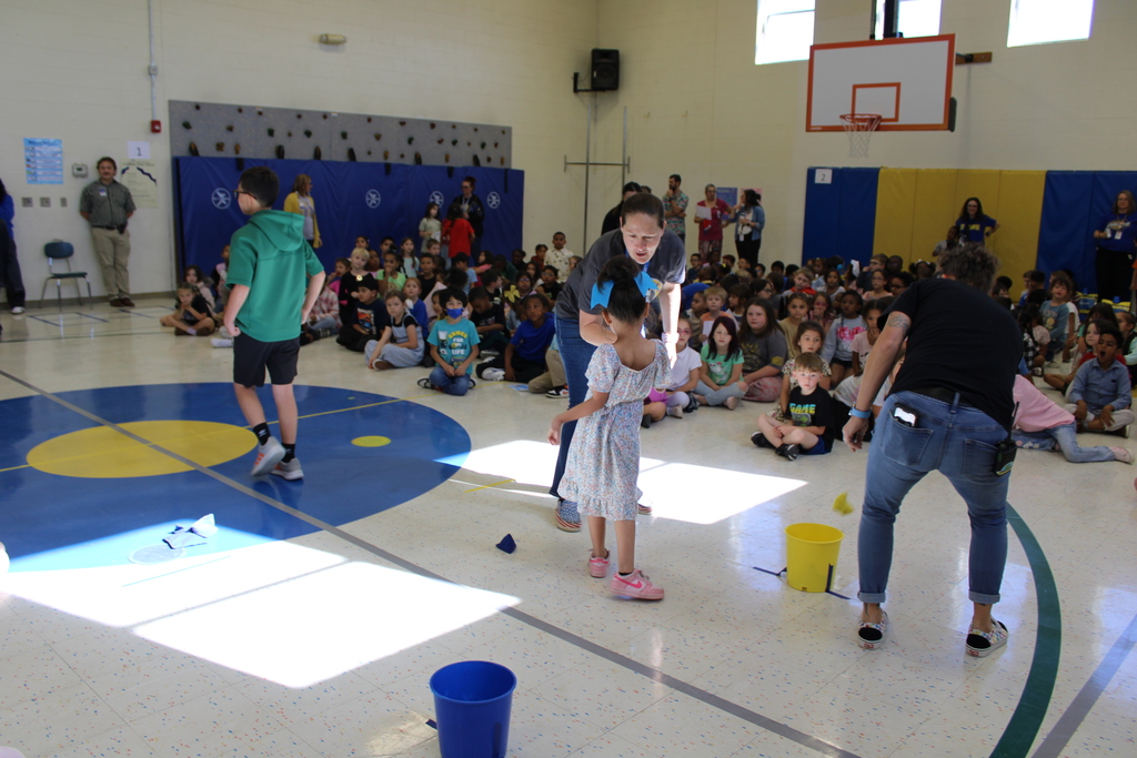Teachers congratulate students who won
