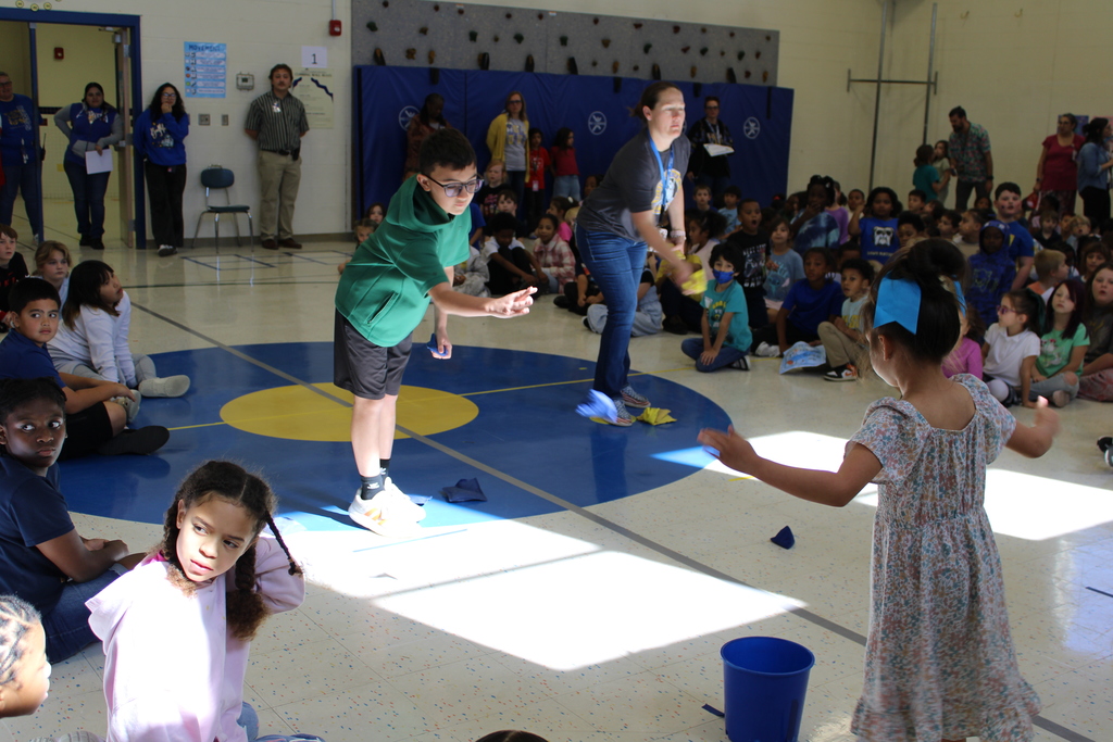 Teachers and students play Tic Tac Toe