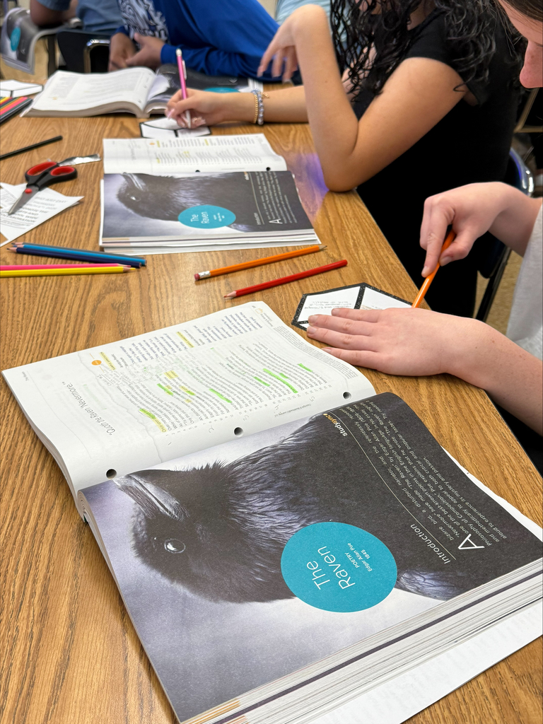Students working on Escher squares in English class