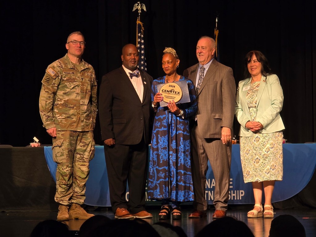 Cen-Tex staff giving Mrs Moore award.