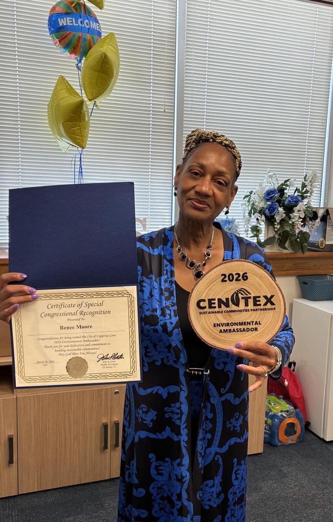 Mrs Moore holding Cen-Tex award
