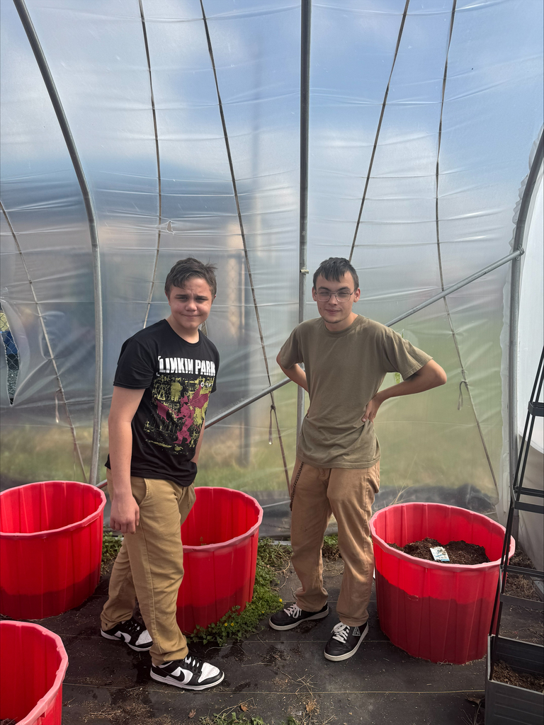 Garden club students in the greenhouse