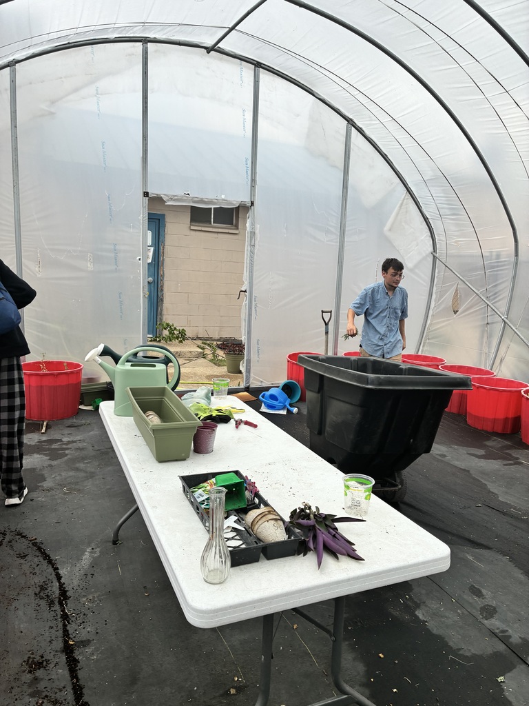Garden club students in the greenhouse