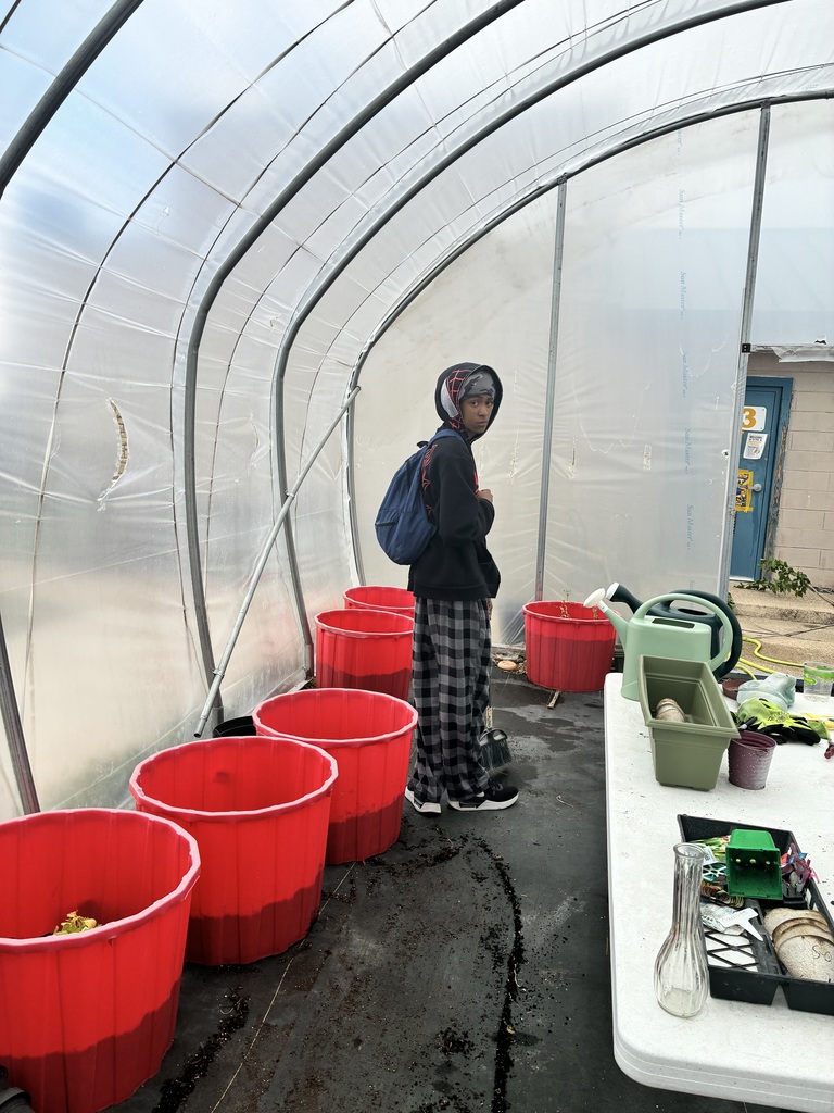 Garden club students in the greenhouse