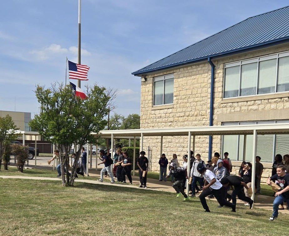 Students take off to search during egg hunt