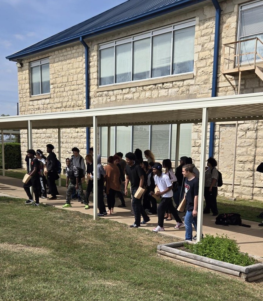 Students lined  up for egg hunt