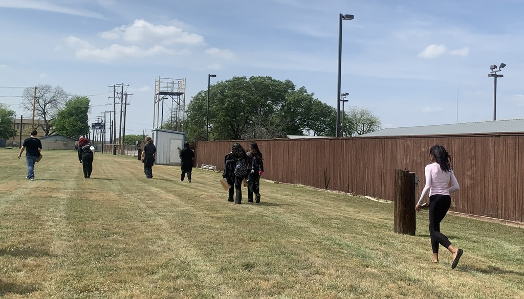 Students move to football field for actual egg hunt