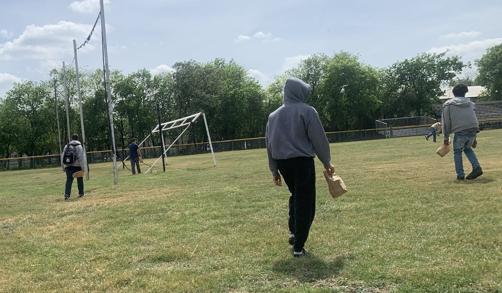 Students move to football field for actual egg hunt