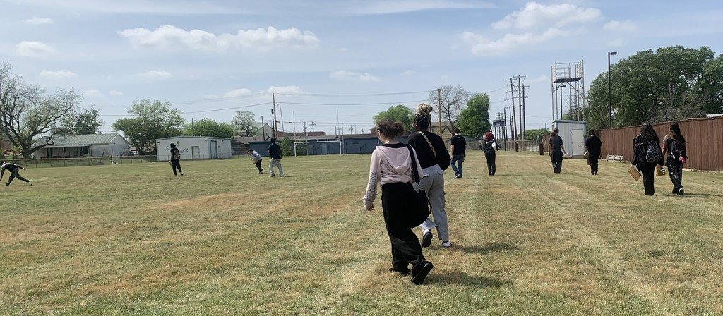 Students move to football field for actual egg hunt