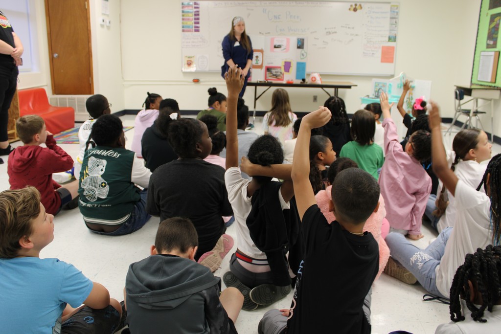 students listening to nurse speak