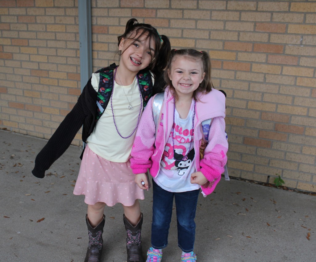 Students pose for purple day