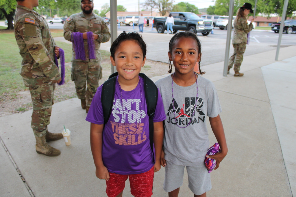 Students pose for purple day
