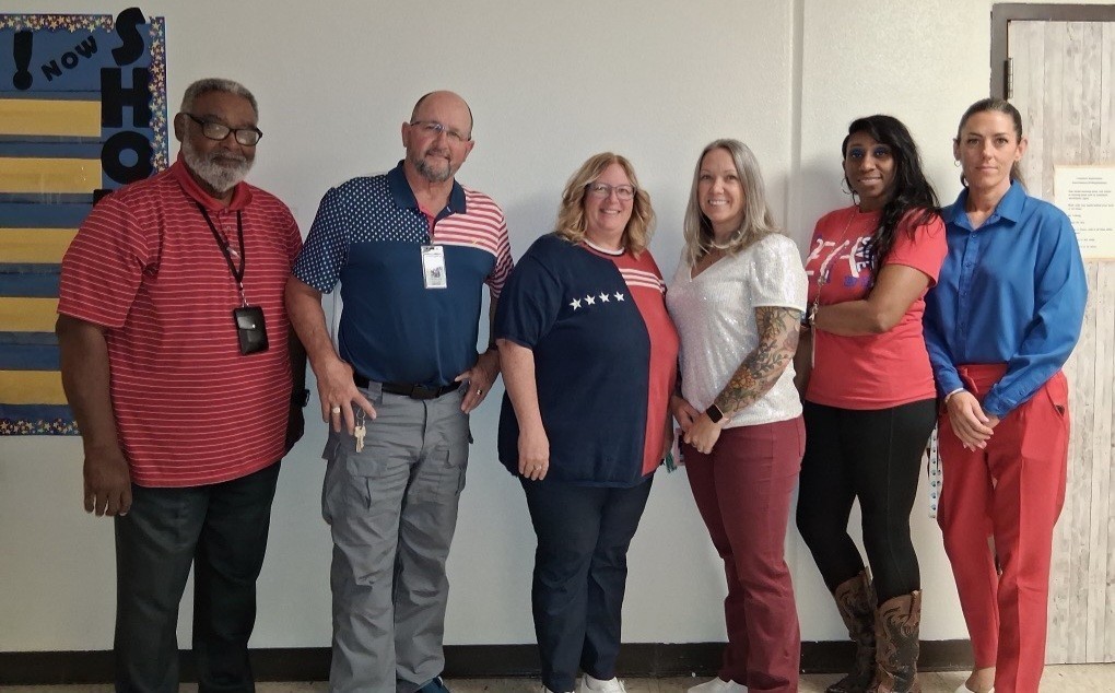 Staff in red, white and blue