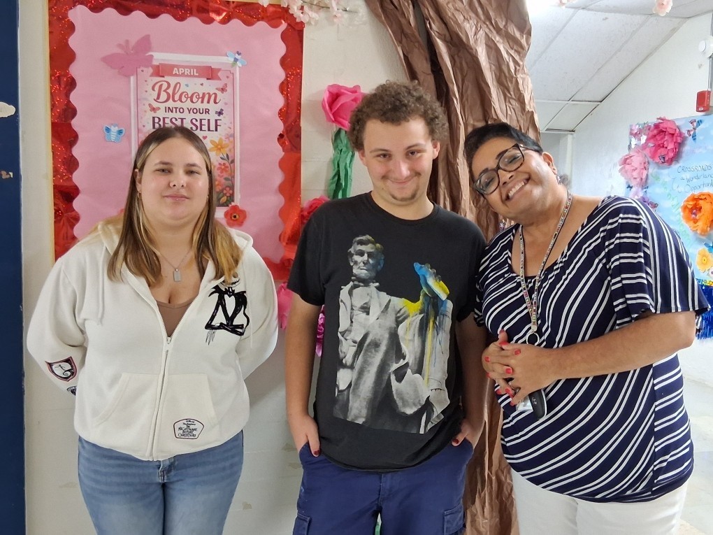 Staff and students in red, white and blue