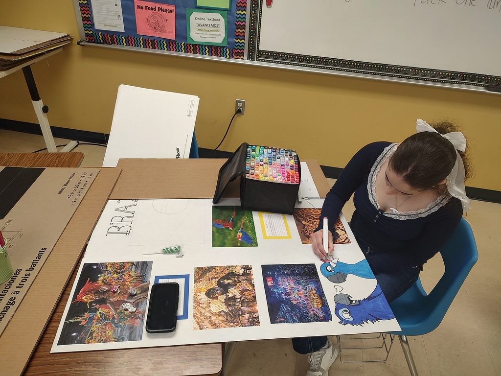 Students setting up for MULTICULTURAL NIGHT. 