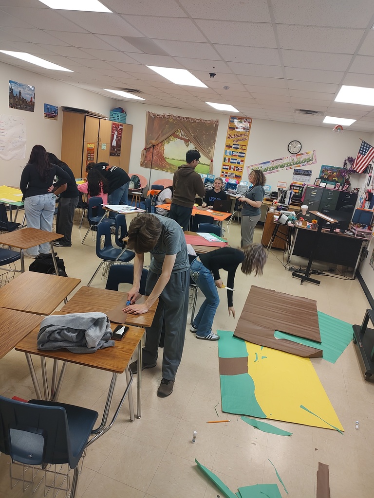 Students setting up for MULTICULTURAL NIGHT. 