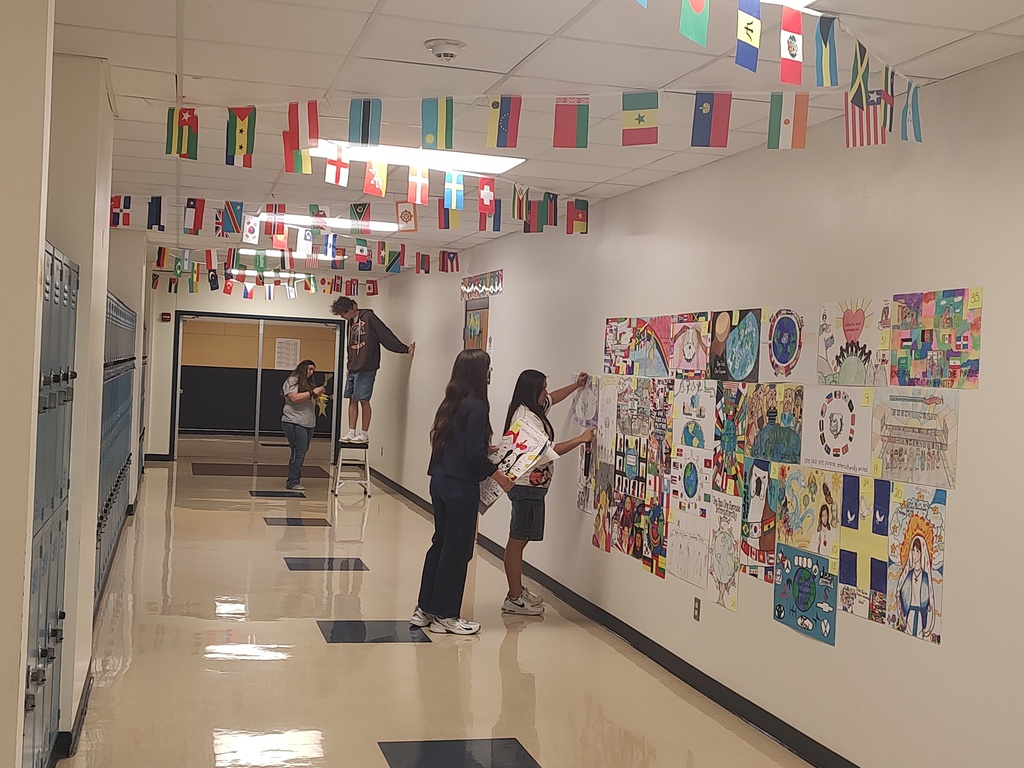 Students setting up the Copperas Cove High School hallway for Multicultural Night