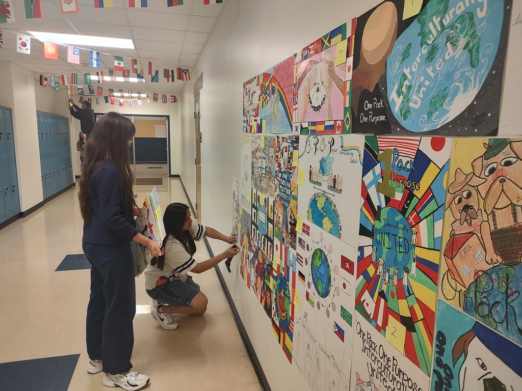 Students setting up the Copperas Cove High School hallway for Multicultural Night