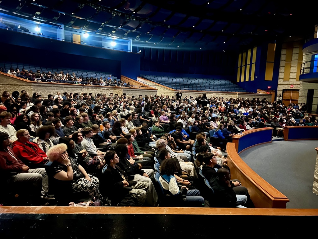 11th grade Copperas Cove High School students watching a video in the auditorium. 