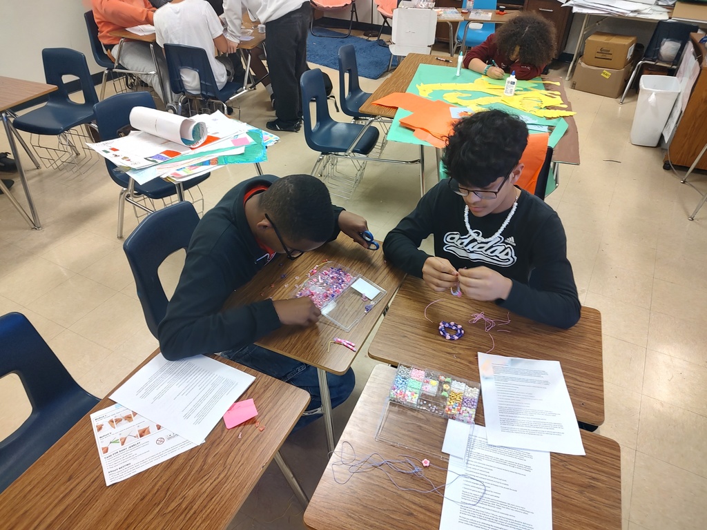 Copperas Cove High School students setting up for Multicultural Night 2026 with decorations in the hallway.