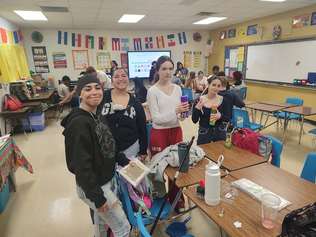 Copperas Cove High School students setting up for Multicultural Night 2026 with decorations in the hallway.