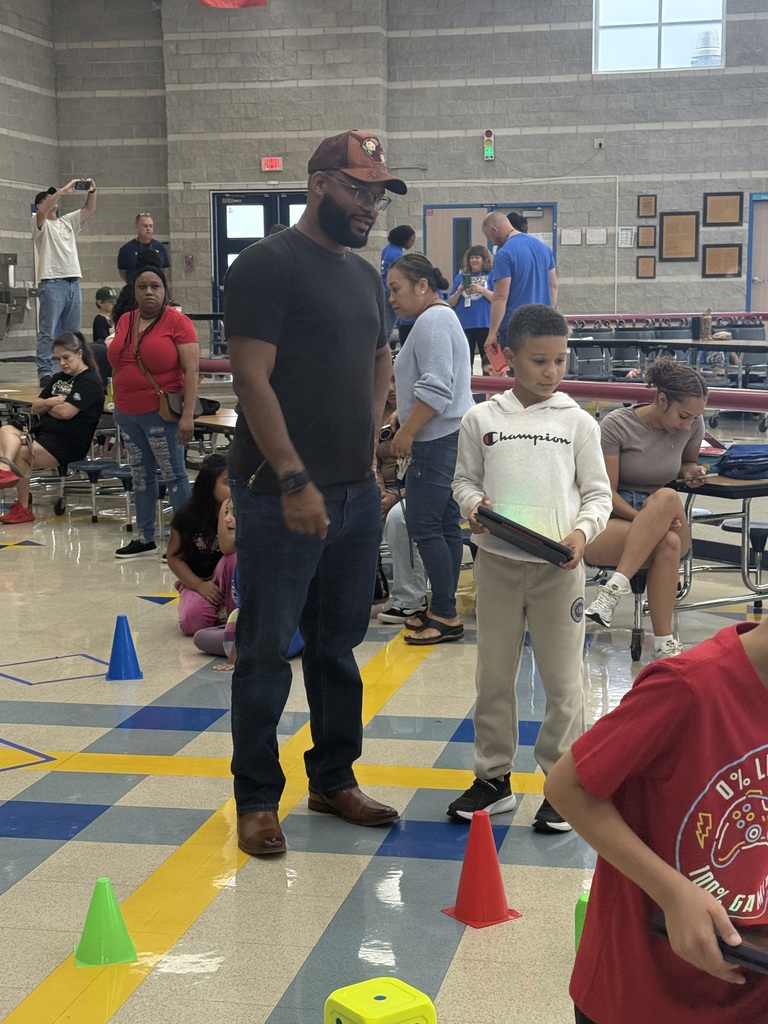 Student demonstrating robot knowledge