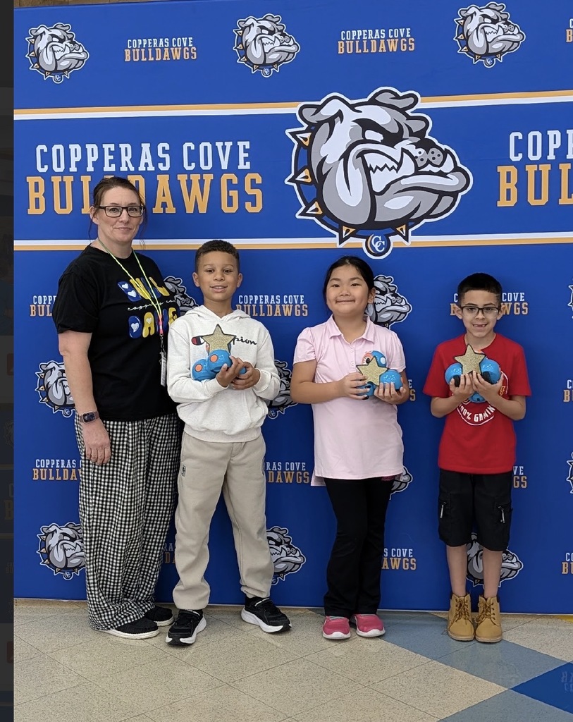 2nd grade Robotics club and club sponsor pose for picture