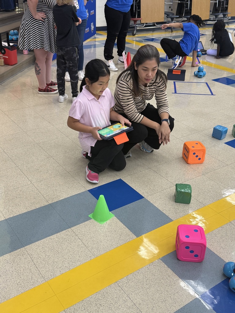 Student demonstrating robot knowledge