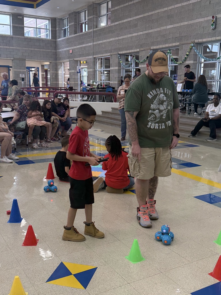 Student demonstrating robot knowledge
