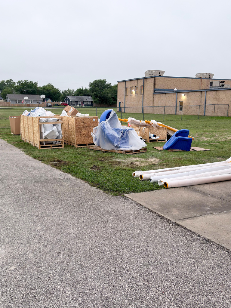 Photo showing construction materials for a school playground
