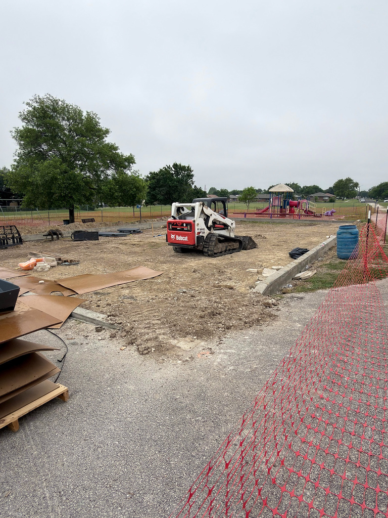 Photo showing dirt work for a school playground