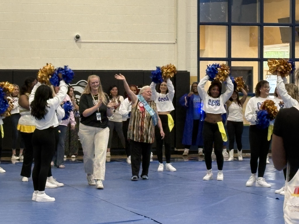 Beverly Duncan waving to the crowd at the Copperas Cove High School pep rally