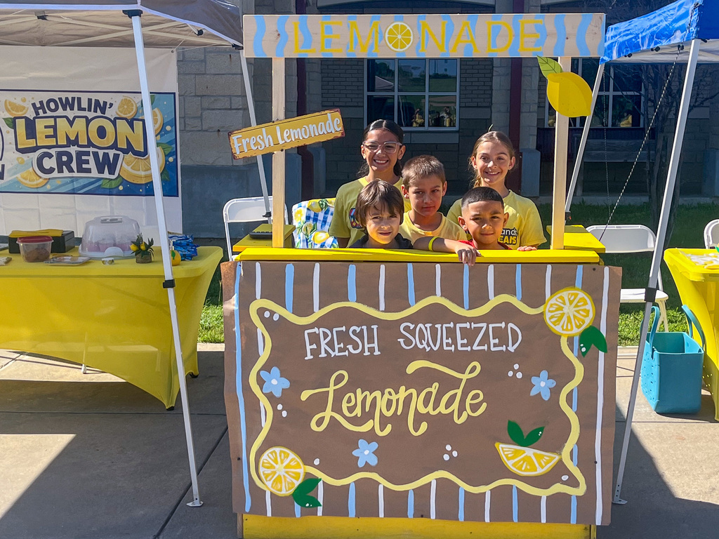 Photo of students running a lemonade day