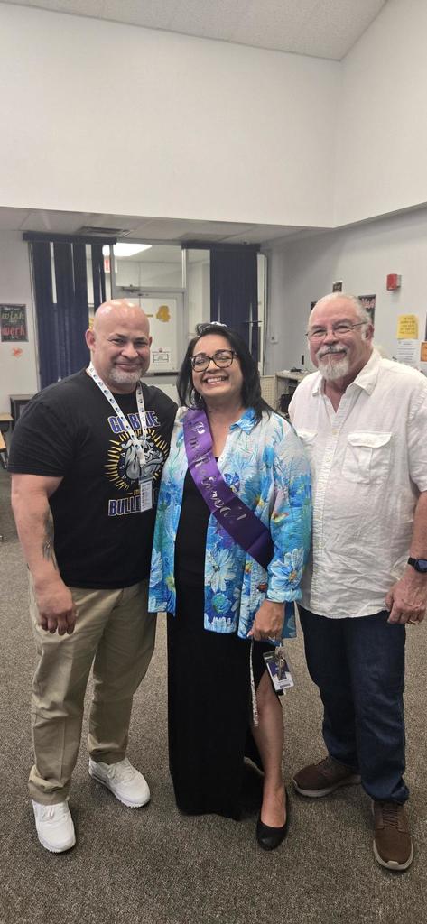 Mrs. Smith with her husband and Mr Alaniz at retirement party
