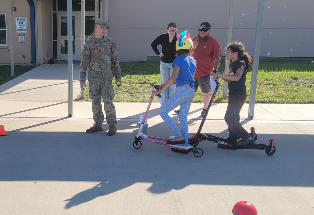 Students stop at bike station to be inspected