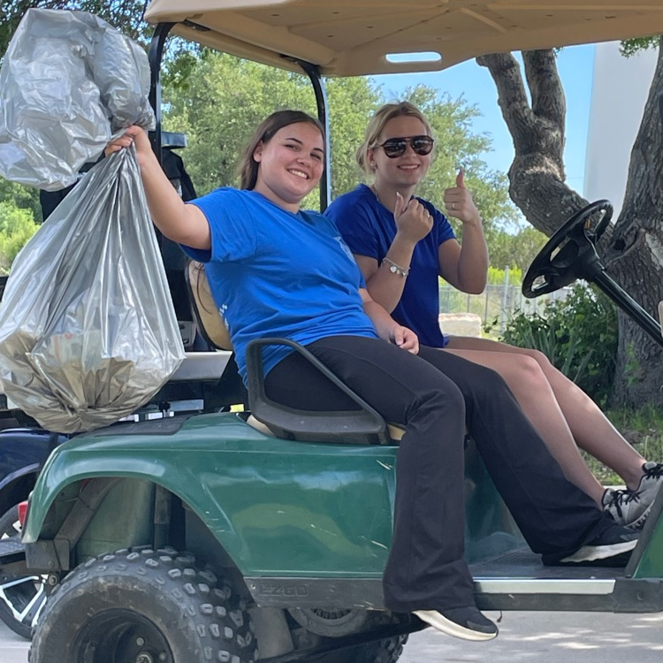 golf team cleaning corse 