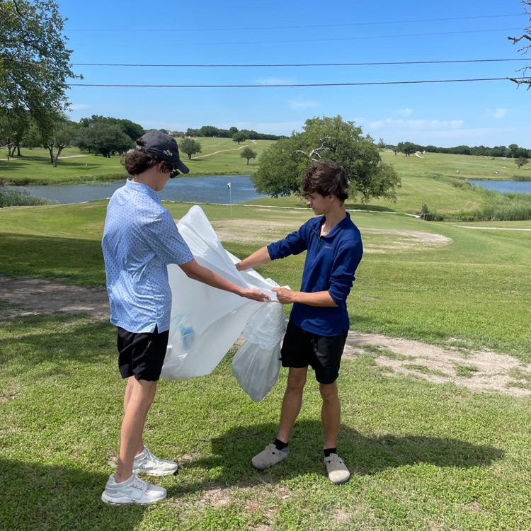 golf team cleaning corse 