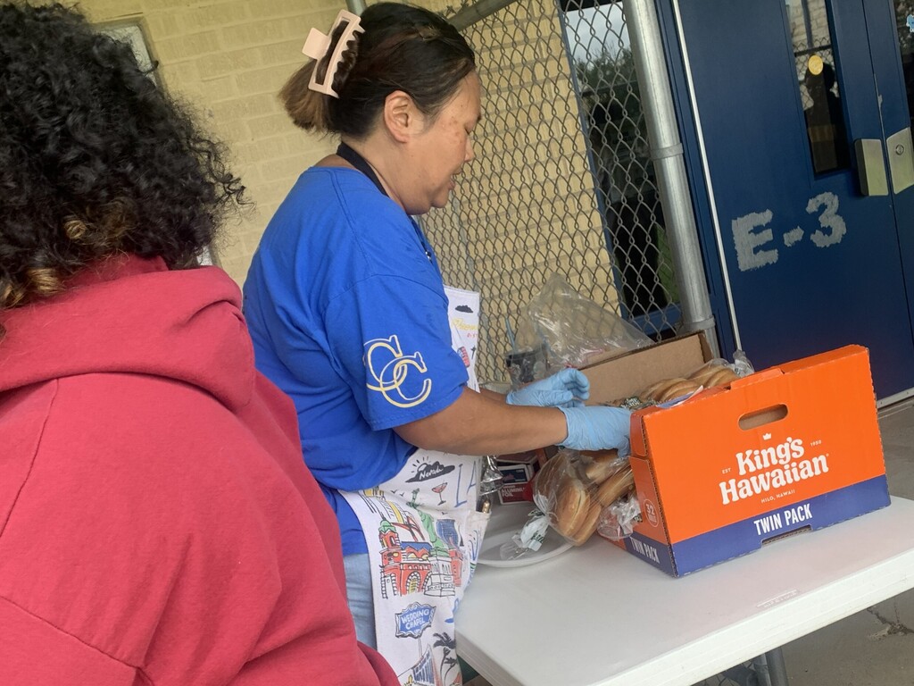 Garner cooking hamburgers