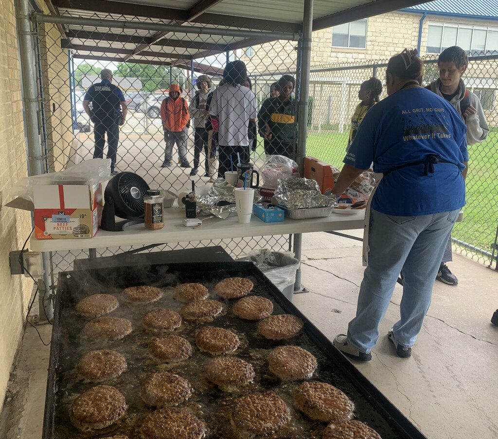 Garner cooking hamburgers