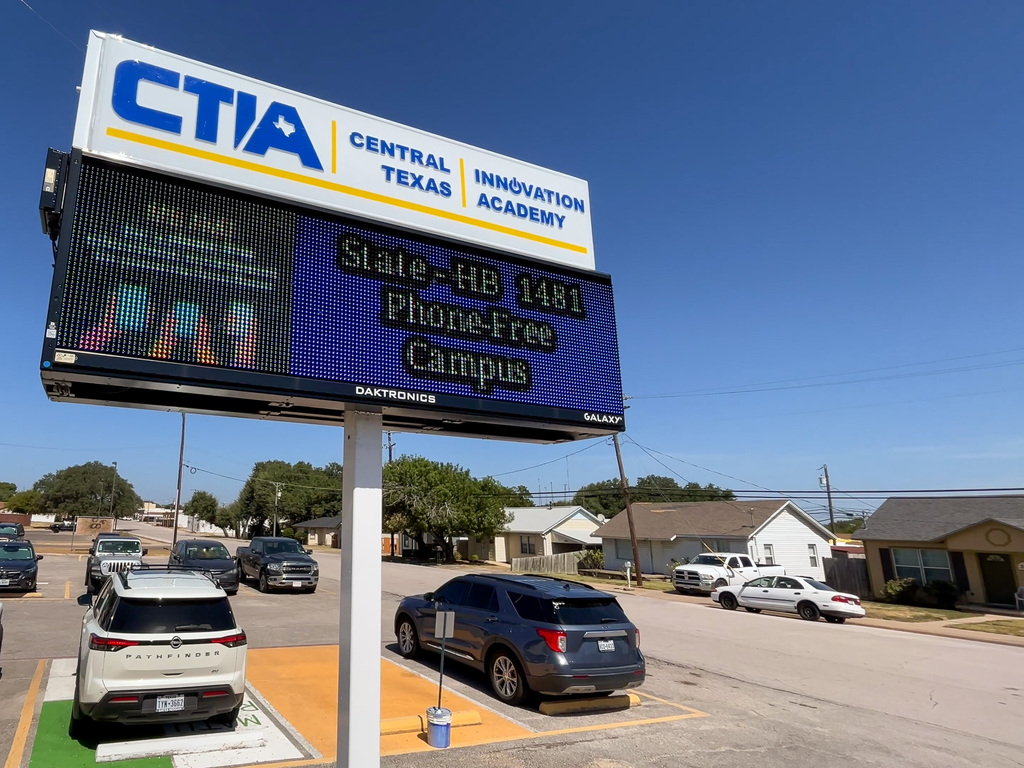 A sign in front of a school reading Central Texas Innovation Academy