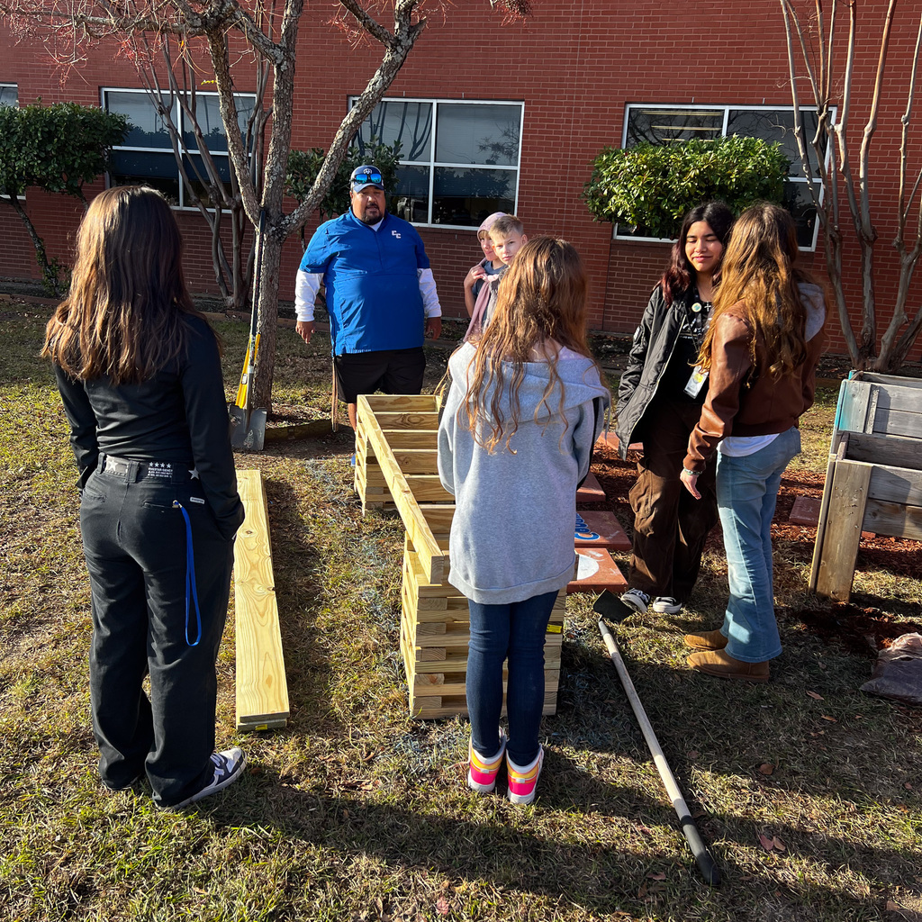 Students building a garden