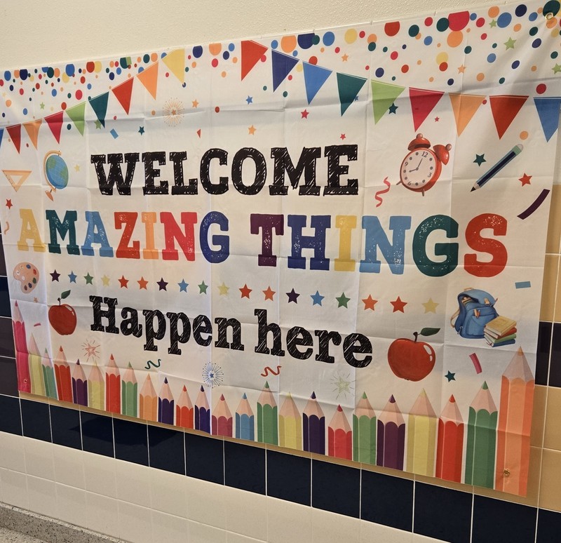 Welcome amazing things happen here sign..