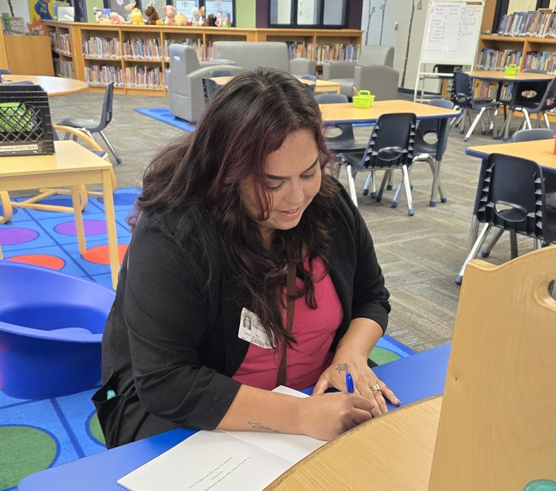 The author signing her book.