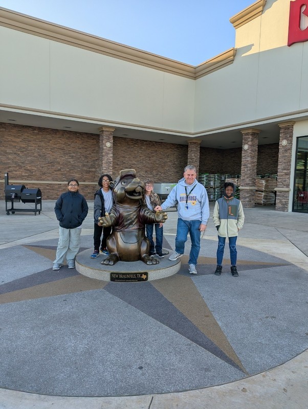 Students and their coach posing.