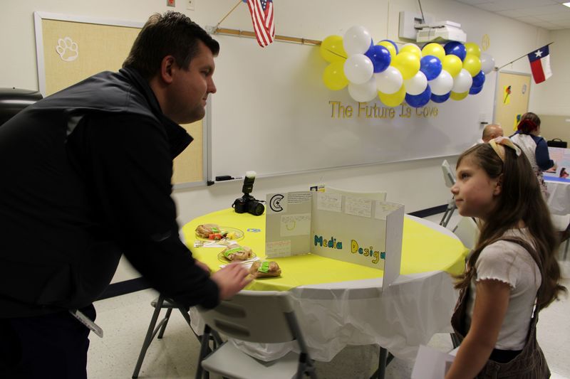 ES2S student presenting to  our head of communications. 