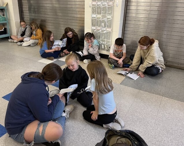 Grade 6 mentors Grade 1 for reading and writing
