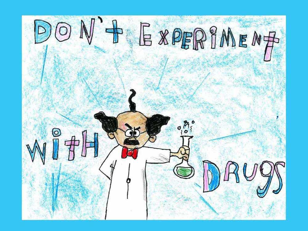child's colorful crayon artwork depicting a made scientist and the words, Don't Experiment with Drugs