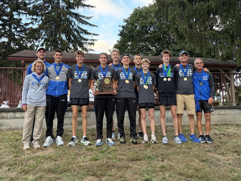 XL athletes (medalists) and their coaches pose for image with L-L League trophy