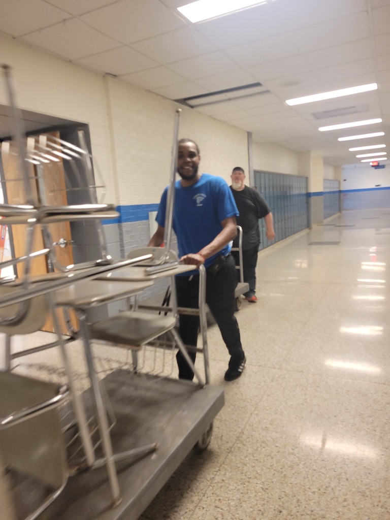 custodian with cart
