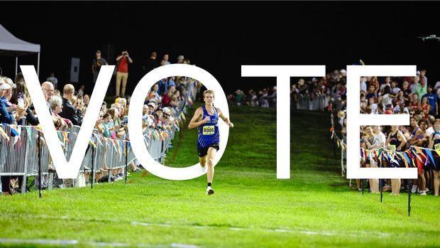 male runner on a track wioth letters V-O-T-E- behind him